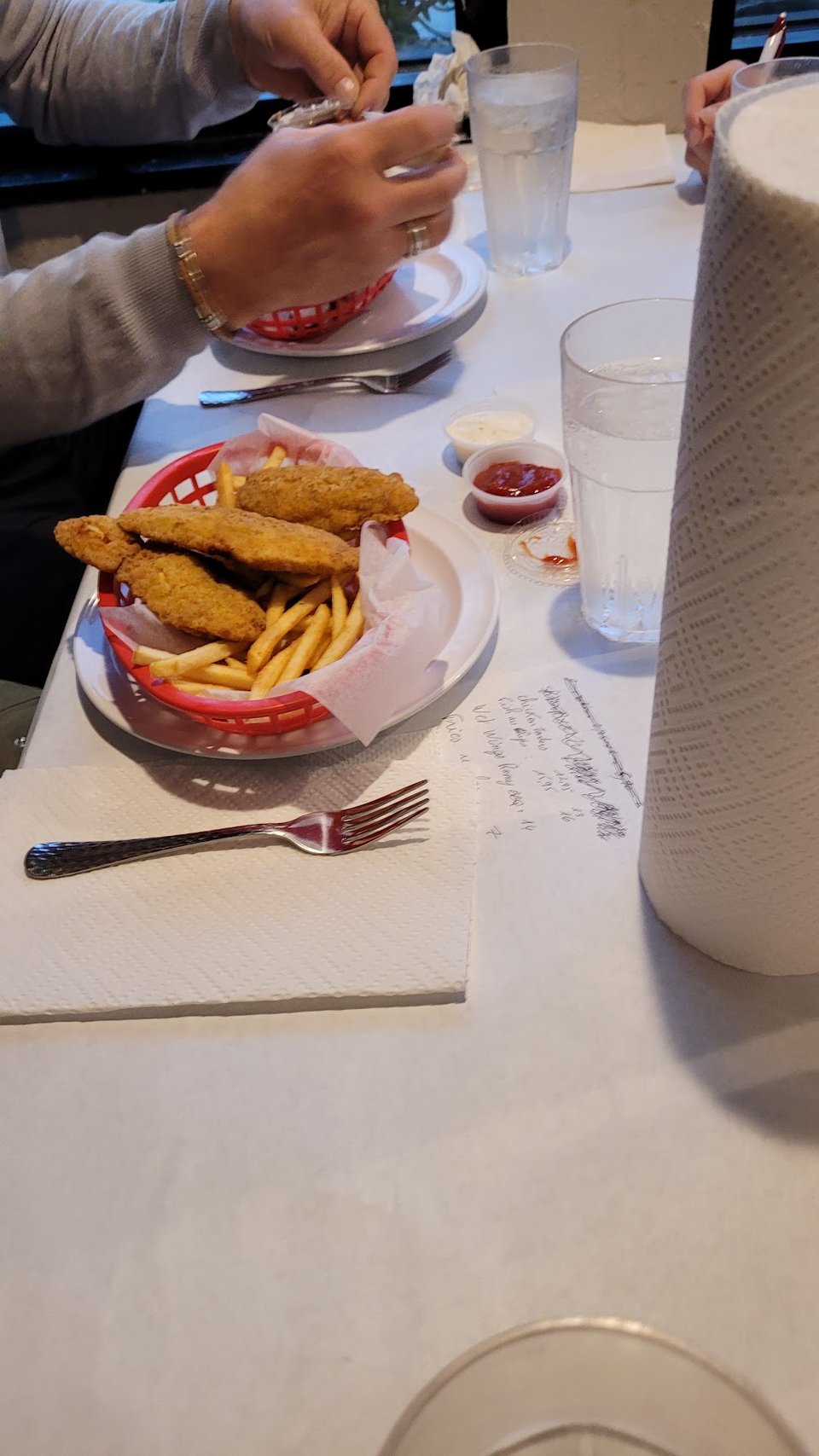 Printed menu with crawfish, clams, shrimp, and crab.