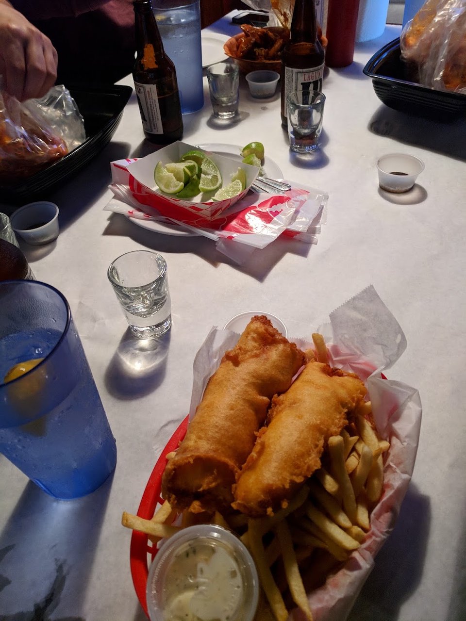 Restaurant menu highlighting Cajun seafood and shareable plates.